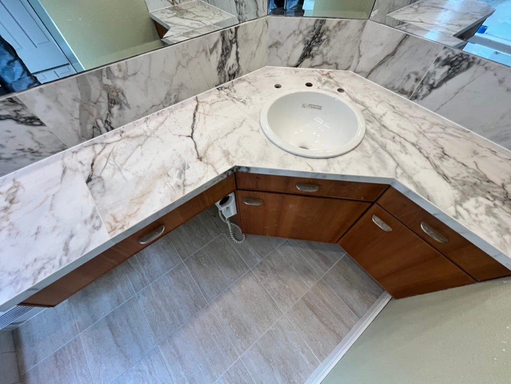 Top-down view of the slab counter with the sink cutout and mitered corners