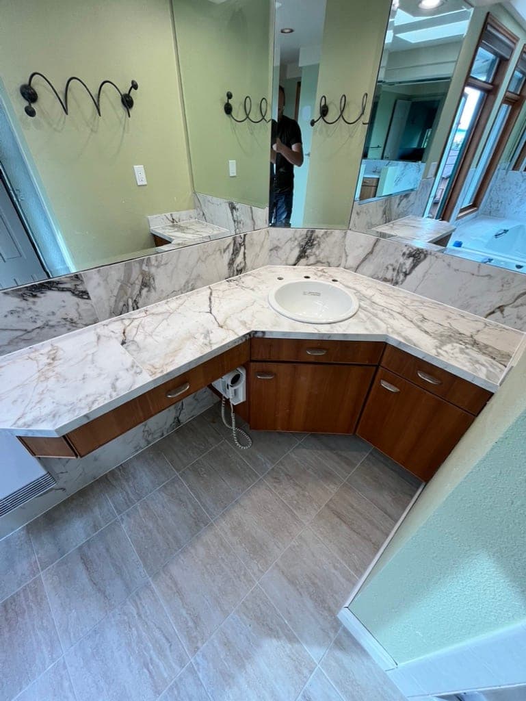 Corner Vanity in Marble-Look Slab