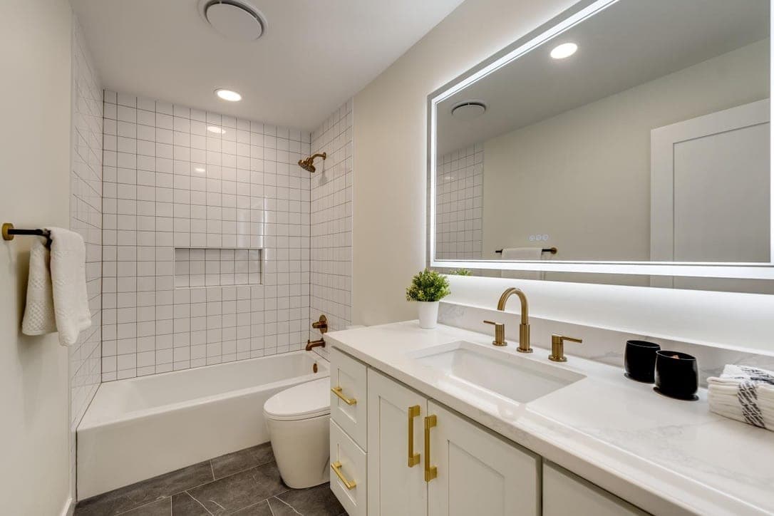 White Tile Tub Bath with Brass